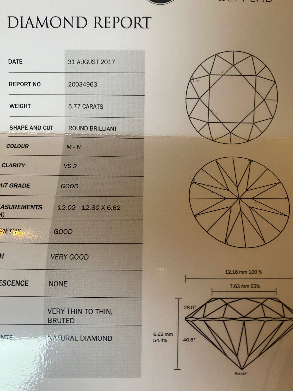 5.77 Carat Round Brilliant Cut Diamond in a Platinum Round Halo Setting