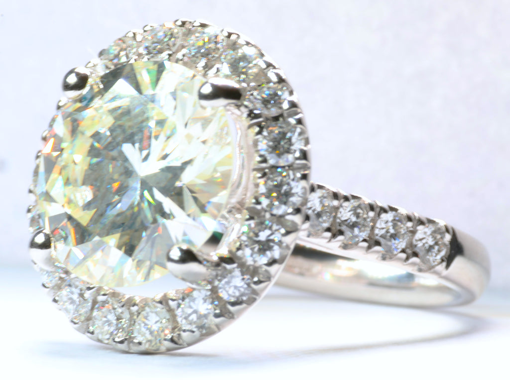 5.77 Carat Round Brilliant Cut Diamond in a Platinum Round Halo Setting