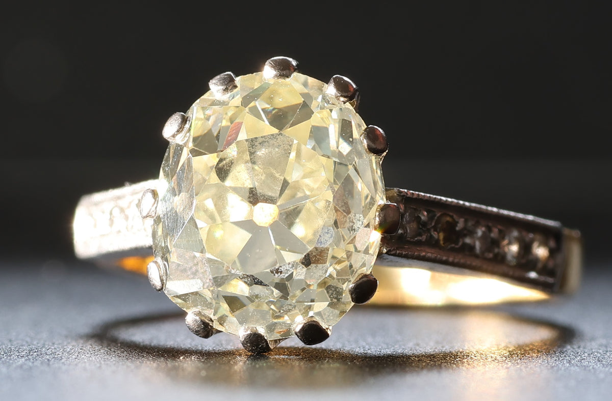 Close-up view of an antique old mine cut diamond ring