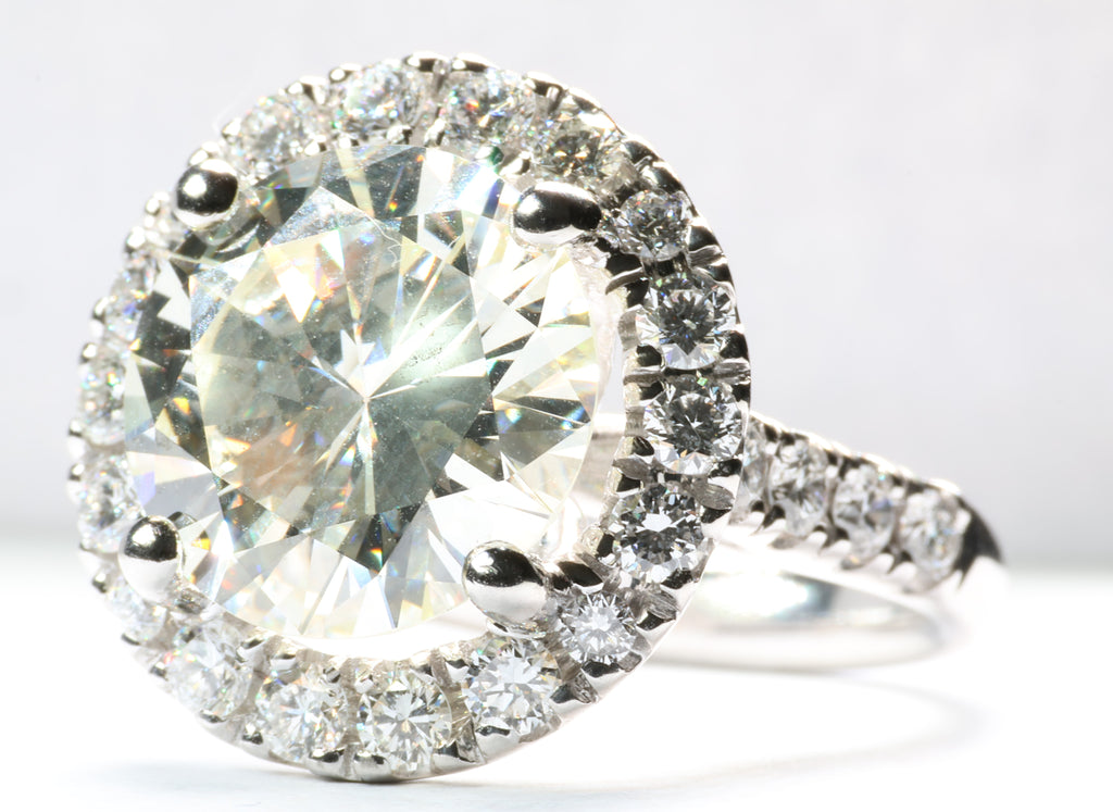 5.77 Carat Round Brilliant Cut Diamond in a Platinum Round Halo Setting