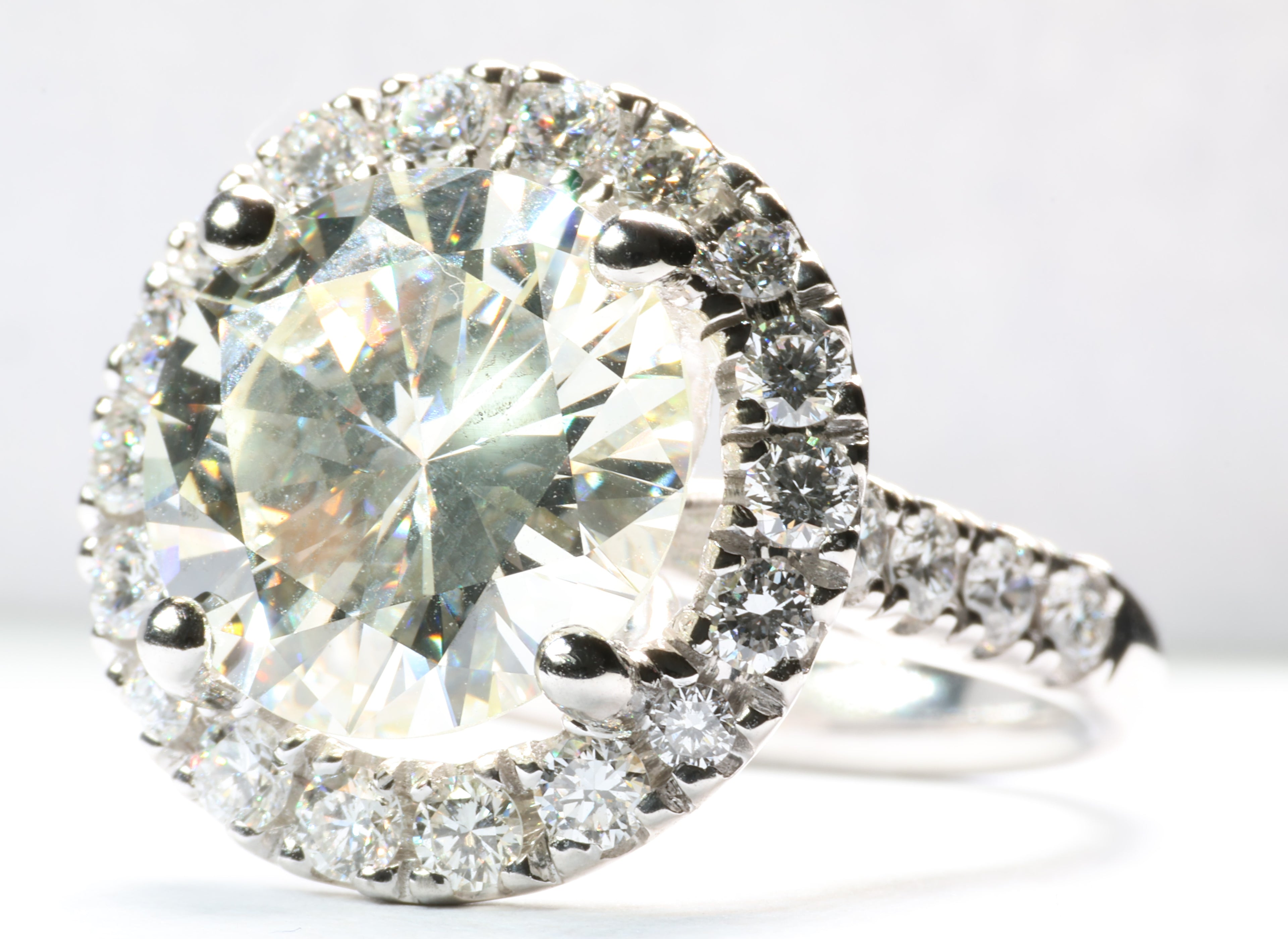 5.77 Carat Round Brilliant Cut Diamond in a Platinum Round Halo Setting