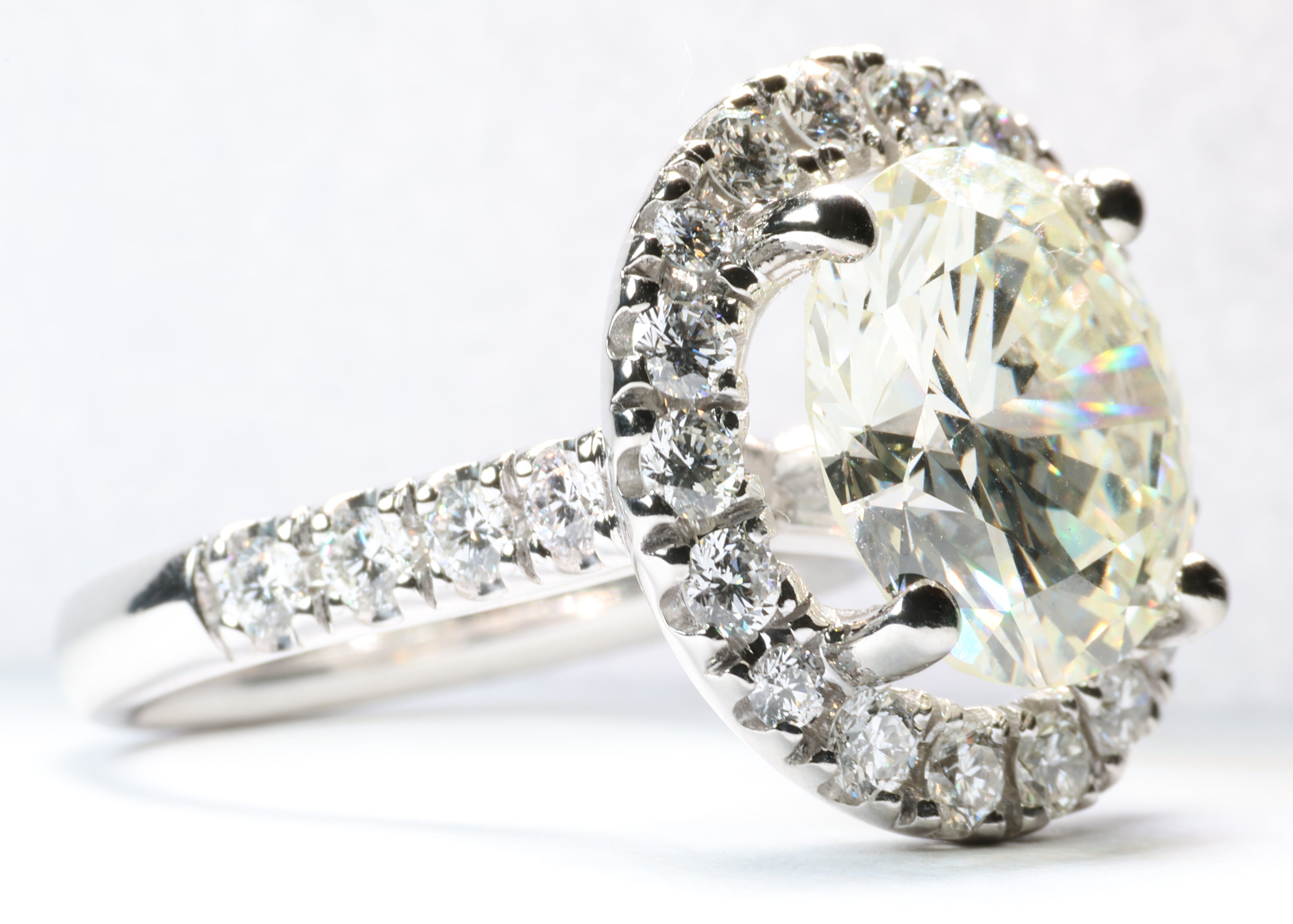 5.77 Carat Round Brilliant Cut Diamond in a Platinum Round Halo Setting